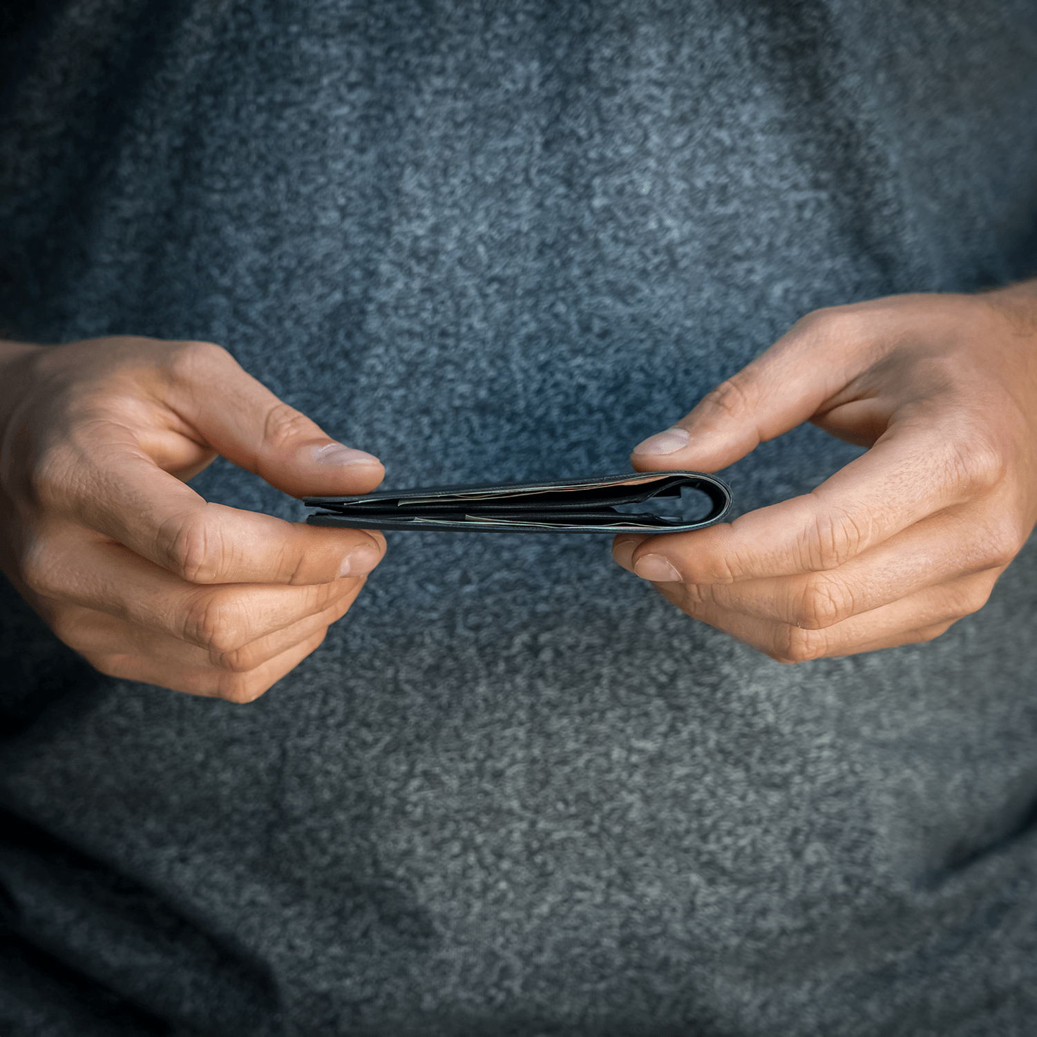 Wayfinder DAYBREAKER modern minimal billfold wallet shown folded in slim view.