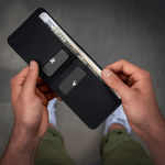 Wayfinder DAYBREAKER modern minimal billfold wallet open view with cash, cards, and boarding pass inside. 